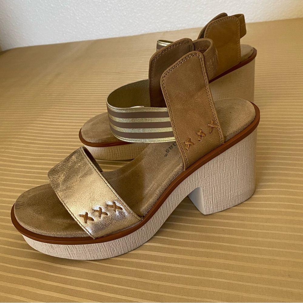 Eye catching summer shoes. High comfy heels. Size 6.5. Lightweight.